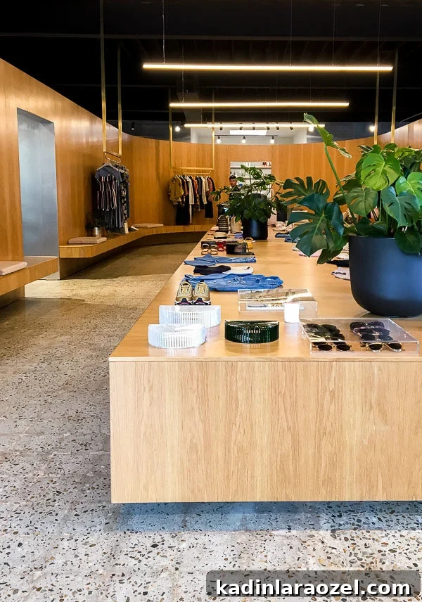 Inside of the clothing store, Need Supply in Richmond, VA with wood cabinets and terrazzo flooring