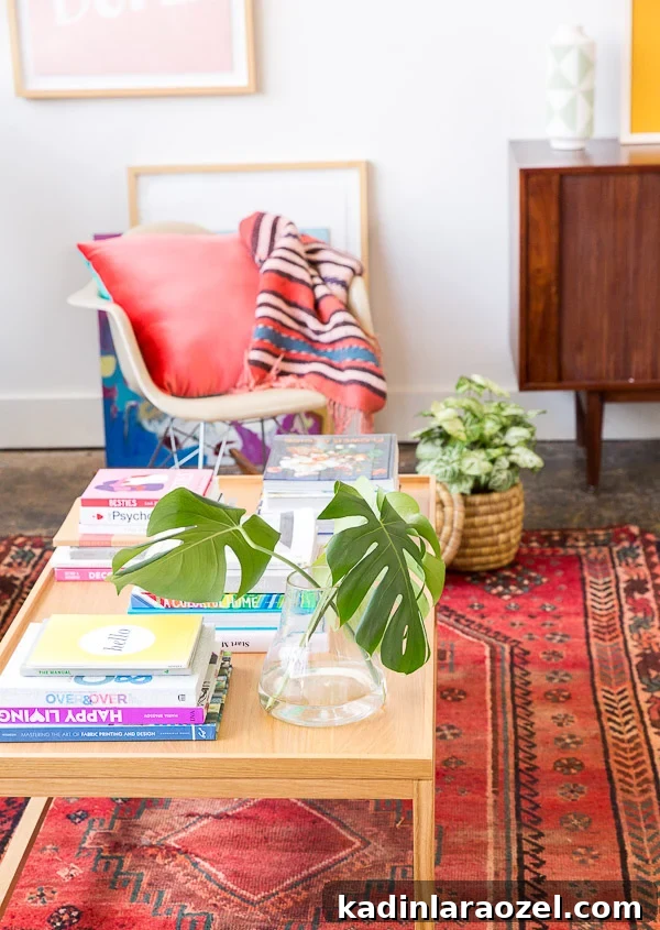 Studio Living Room Reveal: Before and After Transformation Done? 10 An eclectic mid-century loft with pops of color.