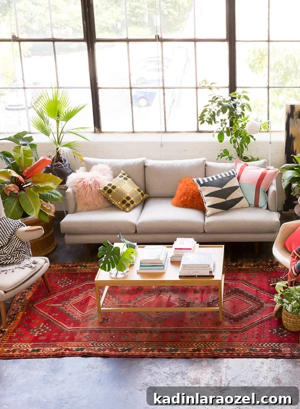 Studio Living Room Reveal: Before and After Transformation Done? 5 An eclectic loft space with pops of color.