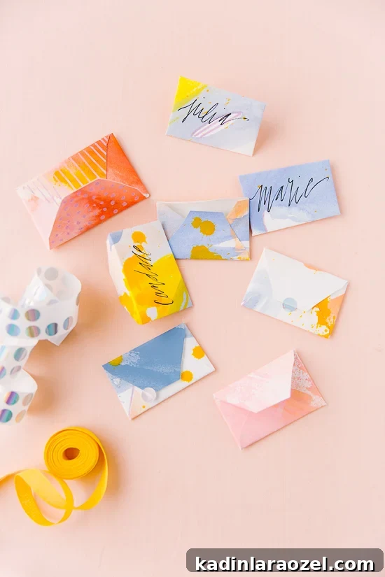 DIY Painted Envelopes: Step-by-Step Guide to Stylish Mailables 4 Painted miniature envelopes (from scratch) on pink background