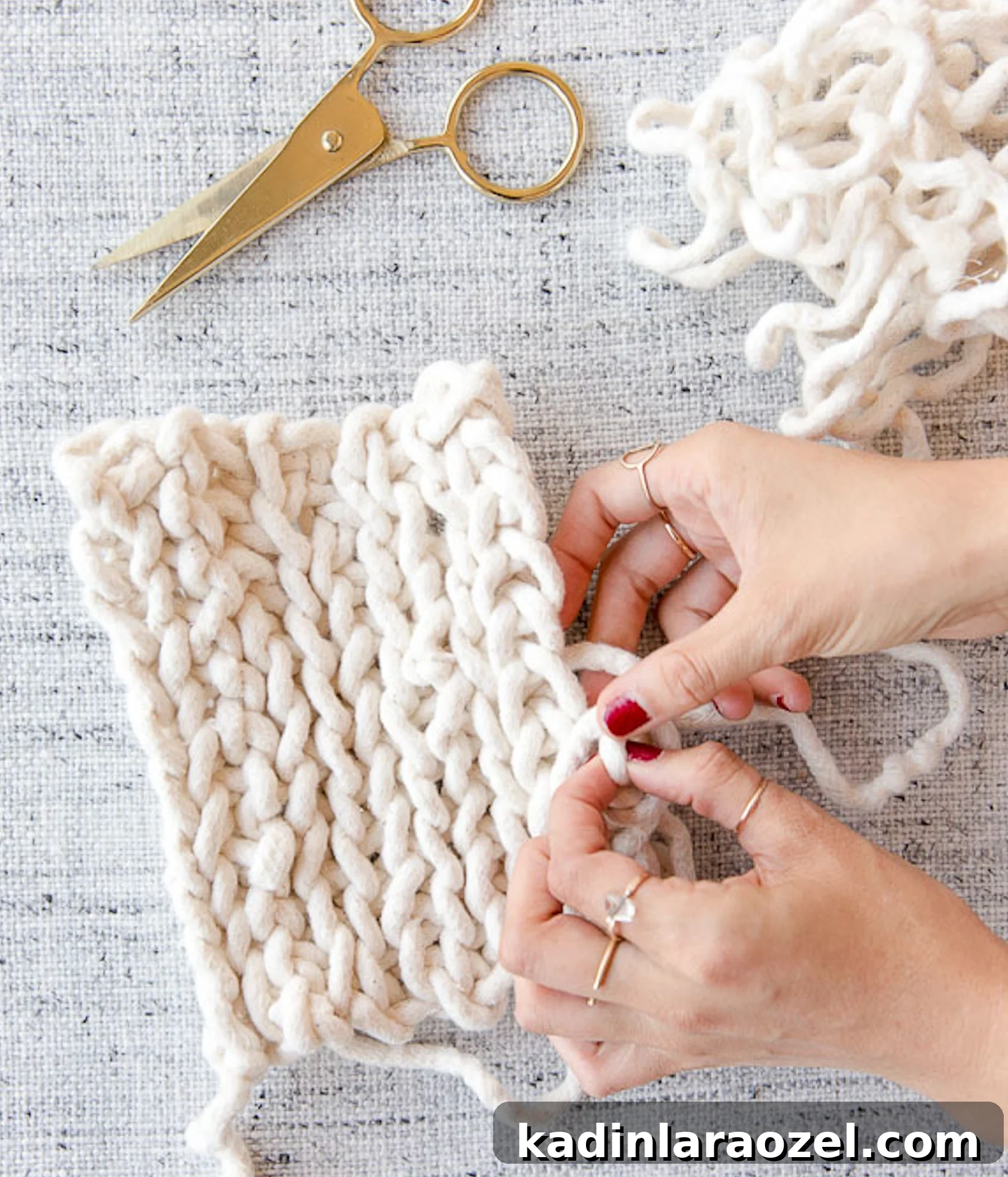 Make a Potholder Using Just One Material 2 woman making woven potholder with white cotton piping and a pair of scissors