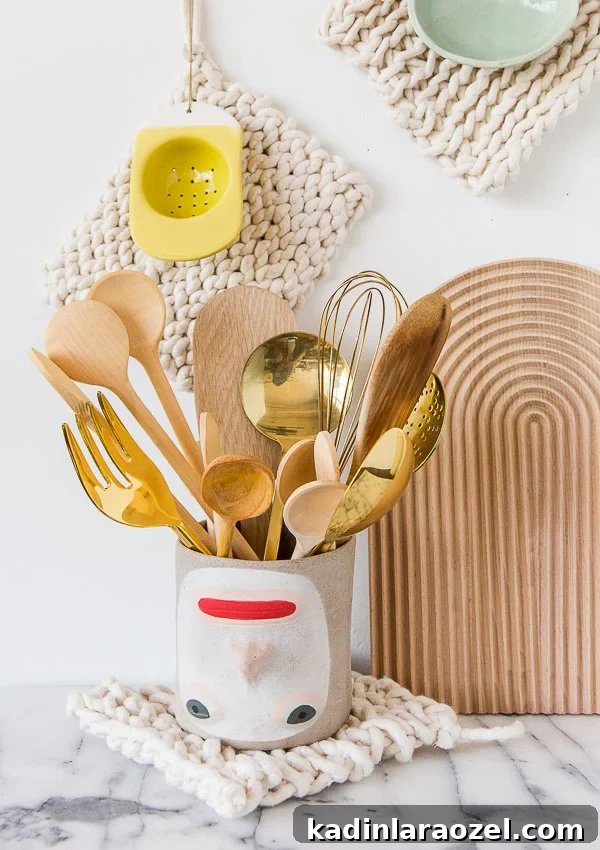 Make a Potholder Using Just One Material 3 marble countertops in a kitchen with wood cutting board and woven potholders hanging on wall