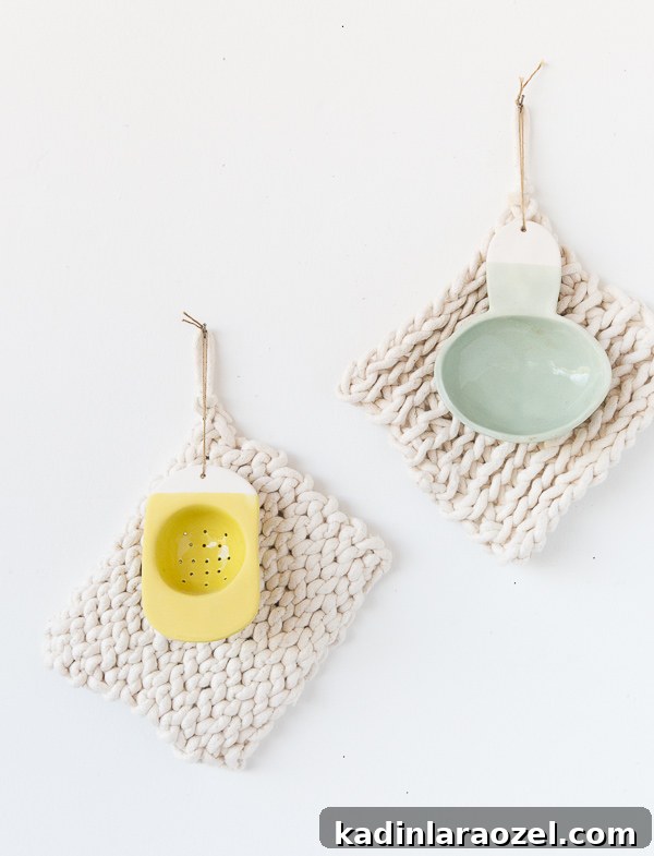 Make a Potholder Using Just One Material 8 ivory woven potholders hanging on a wall with colorful kitchen accessories