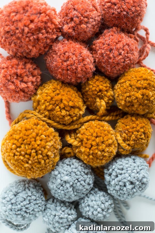 How to make DIY pom poms. Love these fall colors.