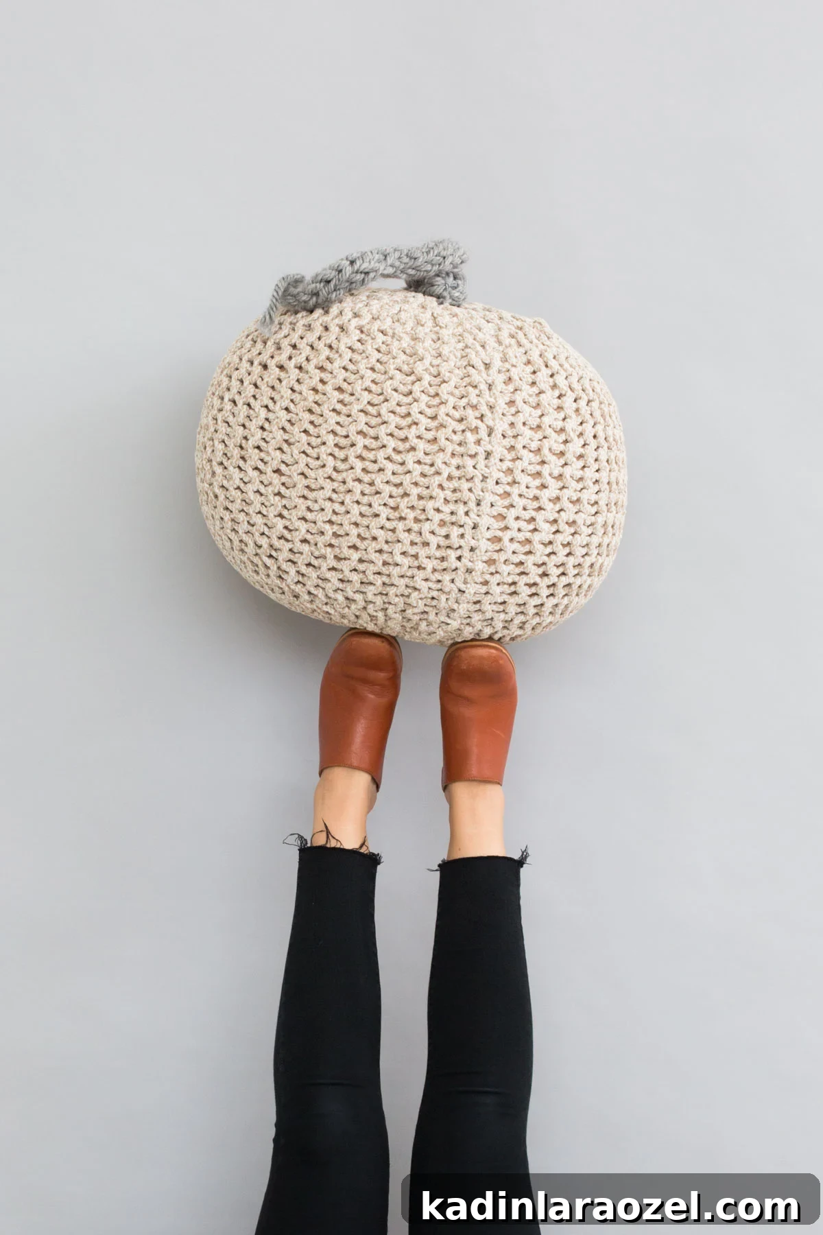 Neutral off white and grey giant knit pumpkin for Halloween