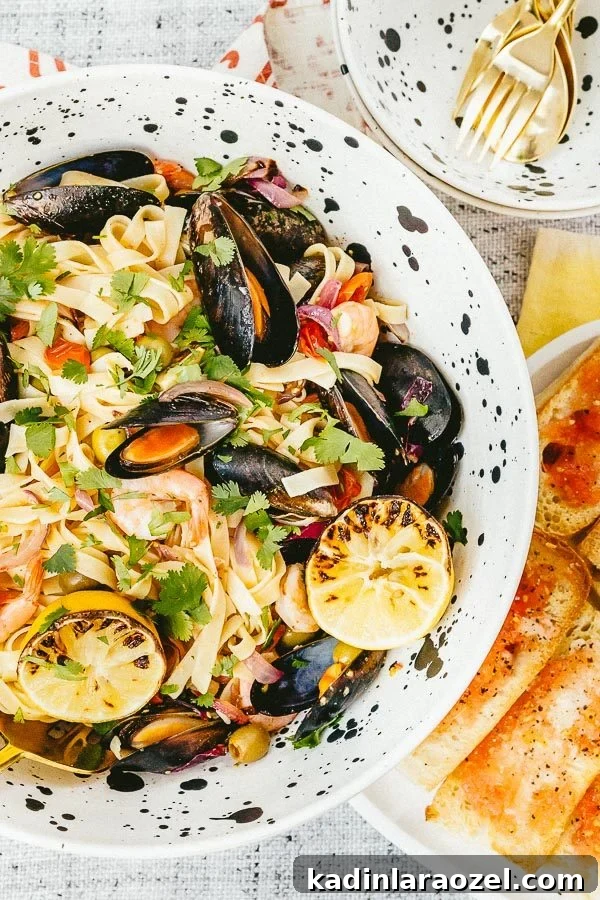 Mouthwatering Seafood Pasta Recipe You Can Make Tonight 8 A seafood pasta recipe that tastes delicious and is actually really easy to make! Click through for the recipe. #seafood #pasta #recipe #yum