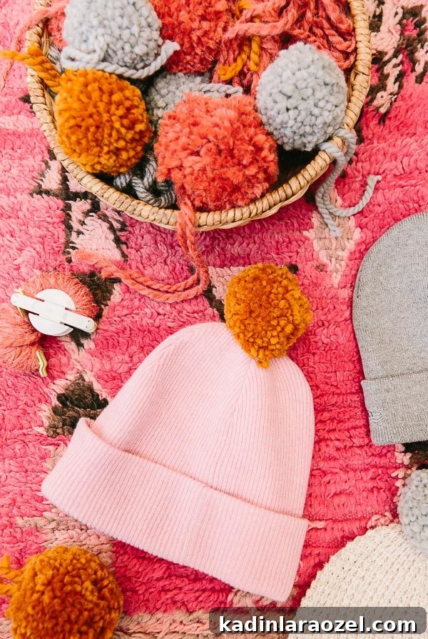 How to make DIY pom pom beanies for fall and winter. Click through for the tutorial.