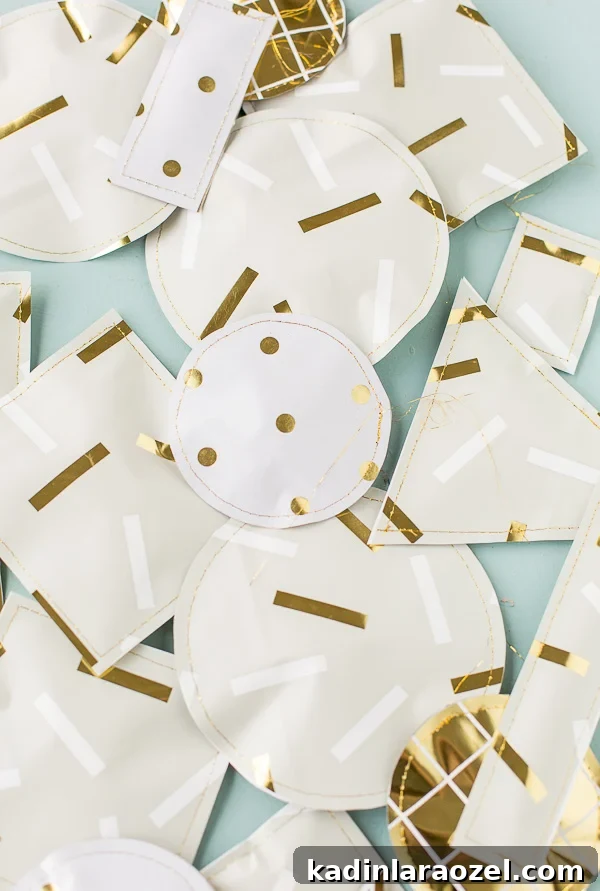 DIY Paper Present Pouches! Turn old gift bags into upcycled paper print pouches for the holidays and beyond. This unique gift wrapping idea is super easy and utilizes what you already have stashed away in your closet at home. #holiday #giftwrap #diy #christmas #wrappingpaper