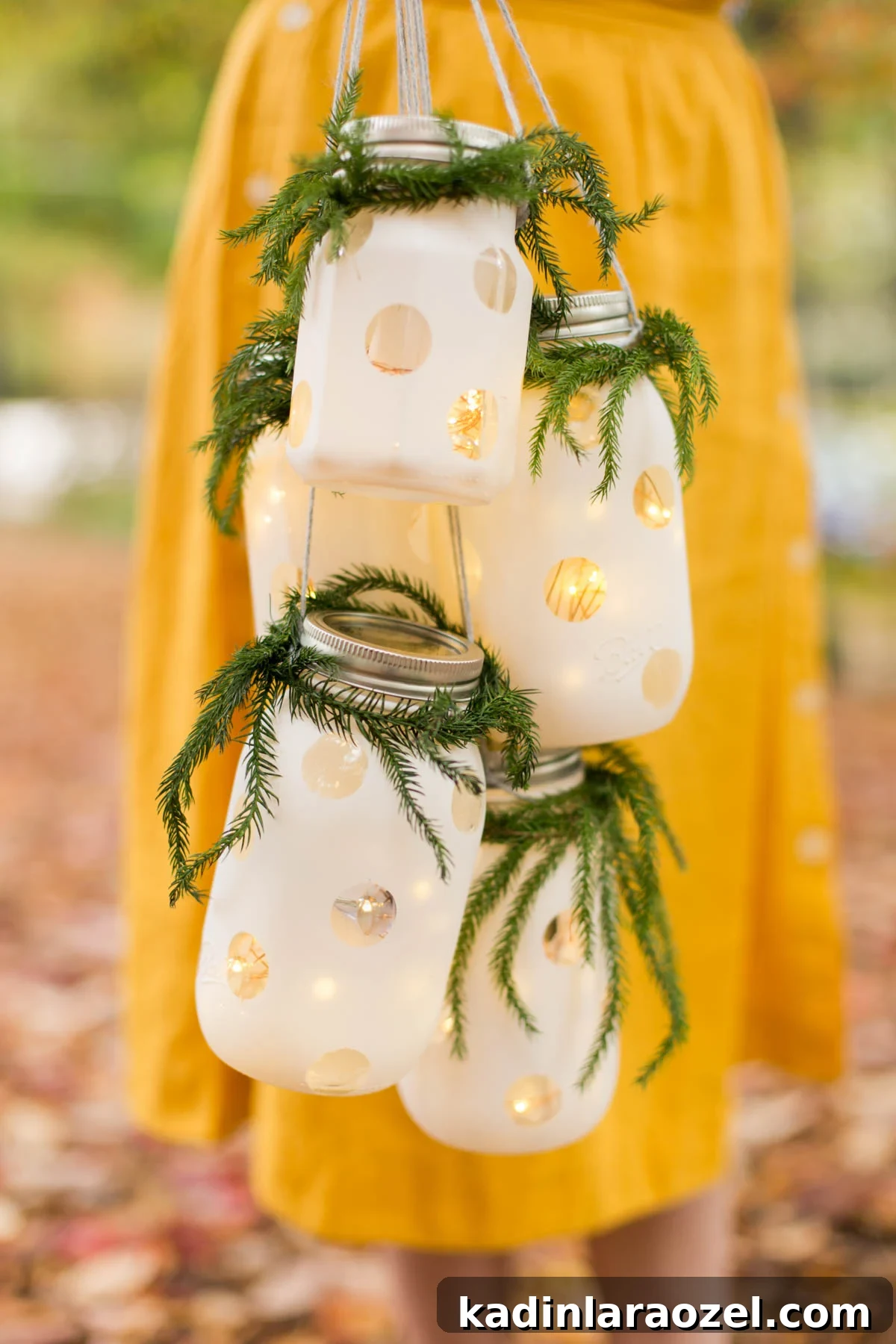 Detail of glass hanging lanterns for Christmas, made of polka dot mason jars