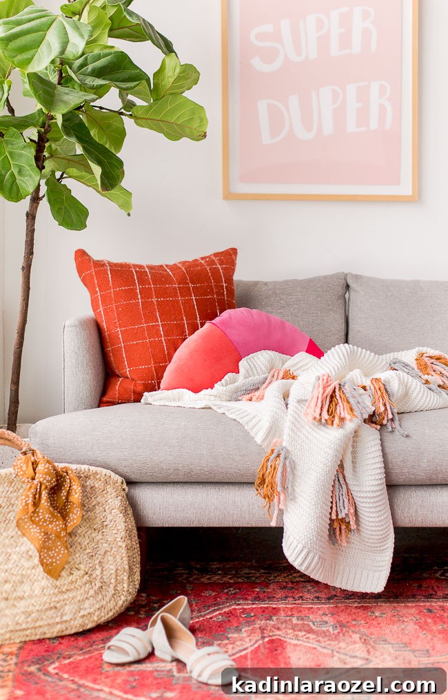 DIY Tassel Blanket Tutorial for a Cozy Winter Home 5 Cozy up with this DIY tassel blanket for winter. It's an easy project, with a little yarn and an existing knit blanket. Click through for the step by step instructions. #diy #blanket #tassel #interiors #homedecor #housewares #cozy #winter