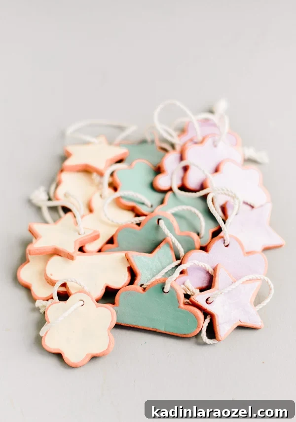 DIY Holiday Ornaments: A Complete Guide to Stylish Decorations 11 DIY clay ornaments in various pastel colors and shapes