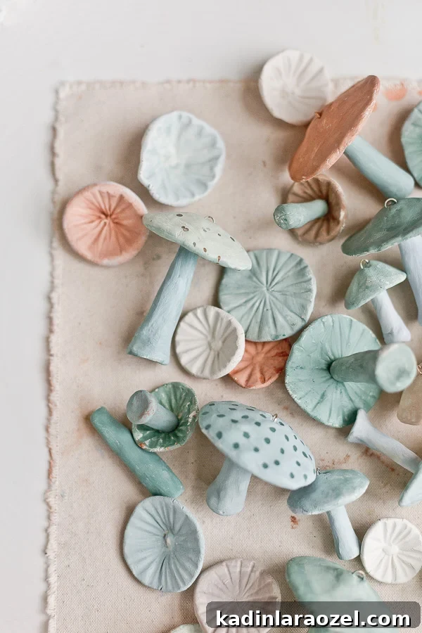 DIY Holiday Ornaments: A Complete Guide to Stylish Decorations 5 Clay mushroom ornaments on canvas background in various earthy green and tan colors.