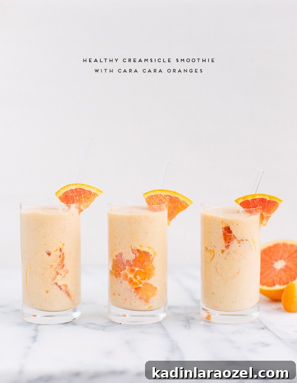 Creamsicle Smoothie Recipe with Fresh Orange and Yogurt 3 Glass of creamsicle smoothie with orange garnish