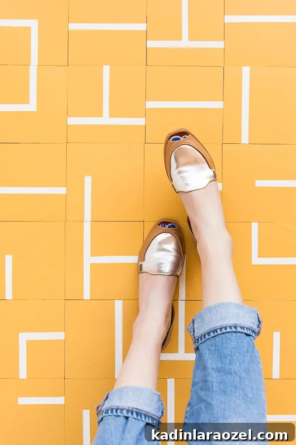Totally floored! Learn how to create your own (custom design) DIY floor tiles on a budget. #flooring #pattern #yellow #mustard #modern #cementtile #tilepattern