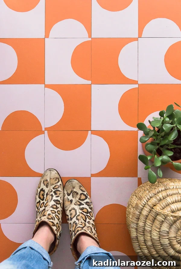 This DIY floor tile is so minimal and vibrant. Click through for the step by step instructions, on a budget. #flooring #pattern #modern #cementtile #tilepattern #colorcombo #ihavethisthingwithfloors
