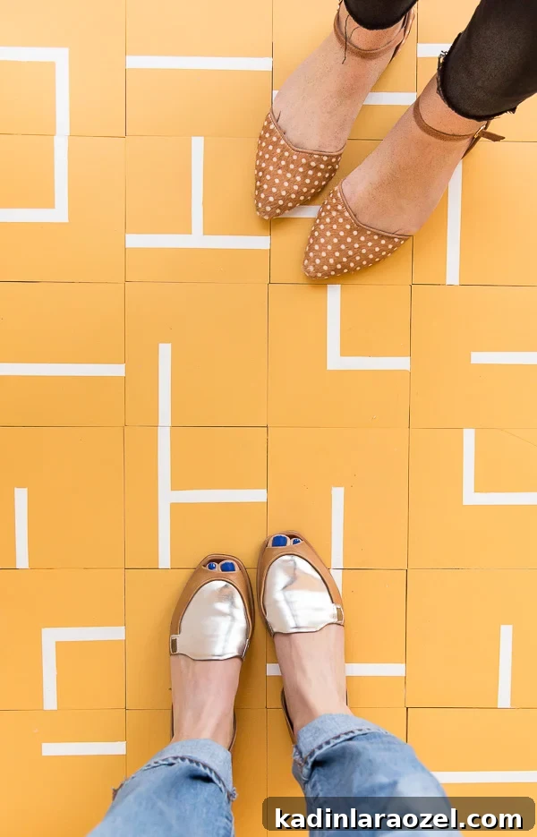 This DIY floor tile is so minimal and vibrant. Click through for the step by step instructions, on a budget. #flooring #pattern #modern #cementtile #tilepattern #colorcombo #ihavethisthingwithfloors