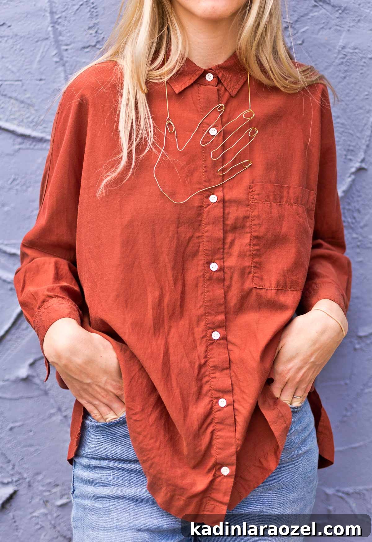 Wire Hand Necklace Tutorial: Beginner Soldering Project Guide 3 Woman wearing rust colored button down and large statement necklace shaped like hand.