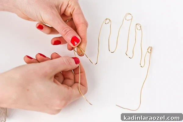 Wire Hand Necklace Tutorial: Beginner Soldering Project Guide 5 Woman bending a wire hand for unique necklace idea