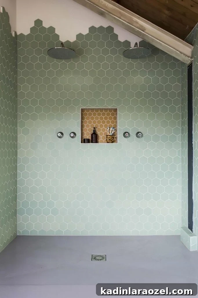 Why Sage Green Is Trending: 9 Reasons to Love the Shade 6 Photo of bathroom shower with sage green tile on the wall.