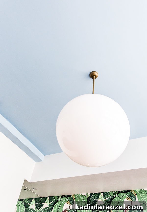 Are Painted Ceilings Worth It? Pros, Costs, and Style Tips 3 Sky blue painted ceilings found at the Dwell House Hotel in Chattanooga, Tennessee. Are you a fan of the painted ceiling trend? Join the debate! #ceilings #paintedceilings #trend #interiors
