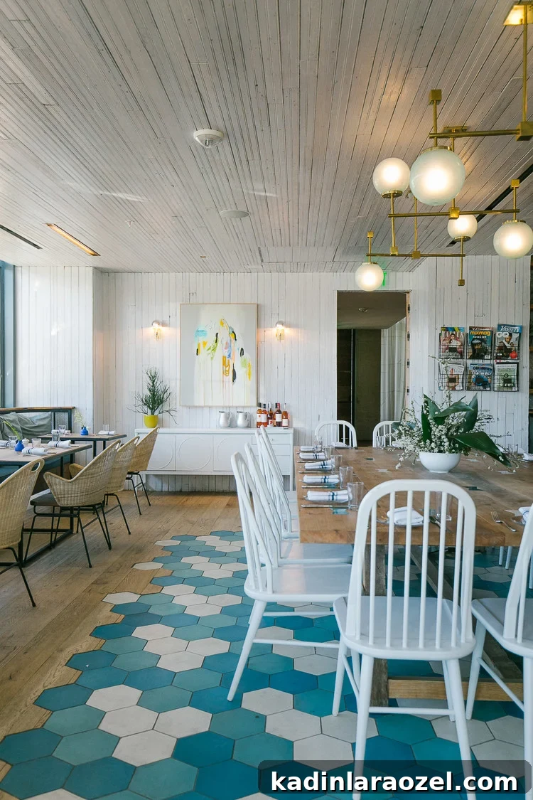 7 Stylish Ways to Use Wall Tile Beyond the Backsplash 7 Unique tile and hardwood combo at Cafe No Se. Want more alternative tiling ideas? Click through for 7 unique and refreshing ways to use wall tiles. #tiling #tilework #interiors #colorful #geometric #uniquetilework
