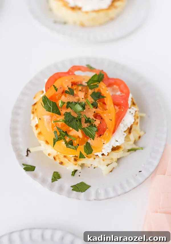 Brady Brunch: 3 Savory Hash Brown Nest Recipes for Your Next Brunch 2 Savory hash brown nests 3 ways at your next brunch (this one is tomato and ricotta). Click through for the recipe! #breakfast #brunch #recipe #hashbrowns #uniquehashbrown