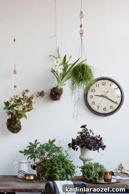 Japanese string garden hanging planters over a rustic wood desk and office space.