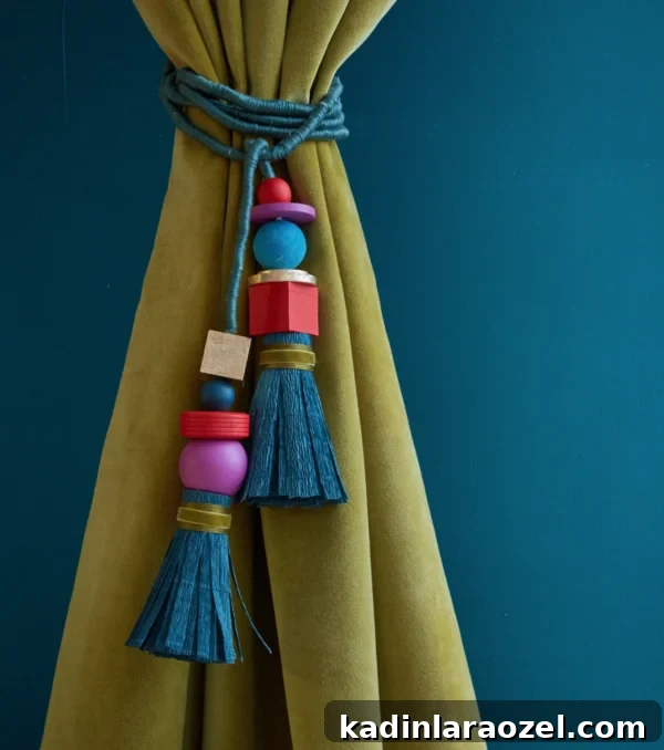 DIY paper and wood curtain tassel tieback from the book Craft the Rainbow (by The House that Lars Built).