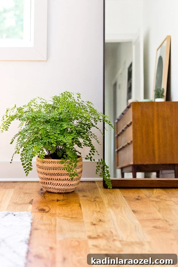 Corners of an organic modern master bedroom. This is the home of lifestyle blogger, Brittni Mehlhoff of Paper and Stitch. #interiors #bedroominspo #organicmoderninteriors #organicmodernbedroom #bedroommakeover