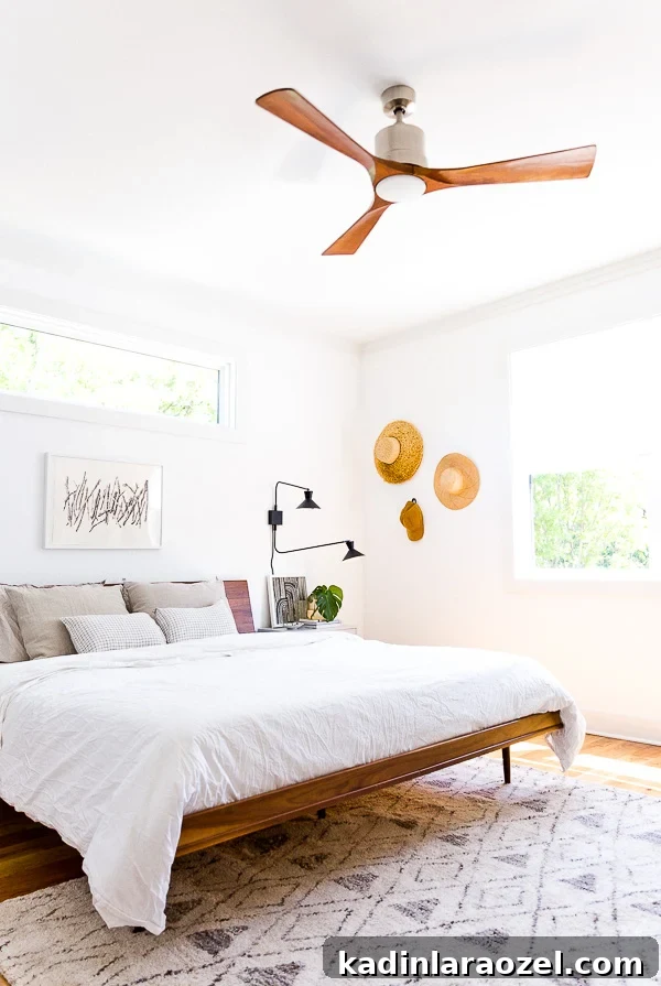 An organic modern bedroom makeover, with a muted color palette. This is the home of lifestyle blogger, Brittni Mehlhoff of Paper and Stitch. #interiors #bedroominspo #organicmoderninteriors #organicmodernbedroom #bedroommakeover