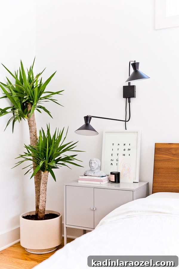 An organic modern bedroom makeover, with a muted color palette. This is the home of lifestyle blogger, Brittni Mehlhoff of Paper and Stitch. #interiors #bedroominspo #organicmoderninteriors #organicmodernbedroom #bedroommakeover