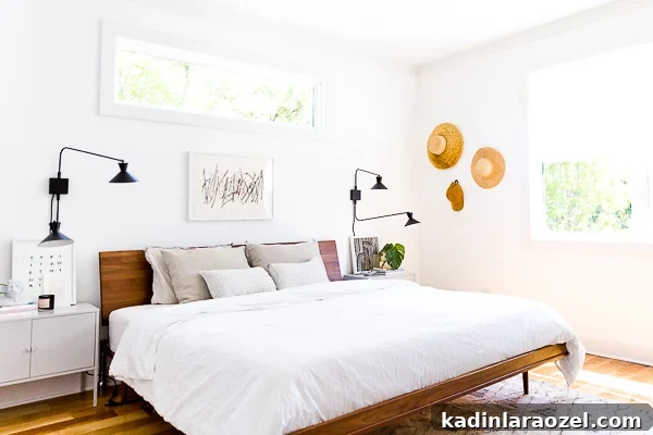 An organic modern bedroom makeover, with a muted color palette. This is the home of lifestyle blogger, Brittni Mehlhoff of Paper and Stitch. #interiors #bedroominspo #organicmoderninteriors #organicmodernbedroom #bedroommakeover