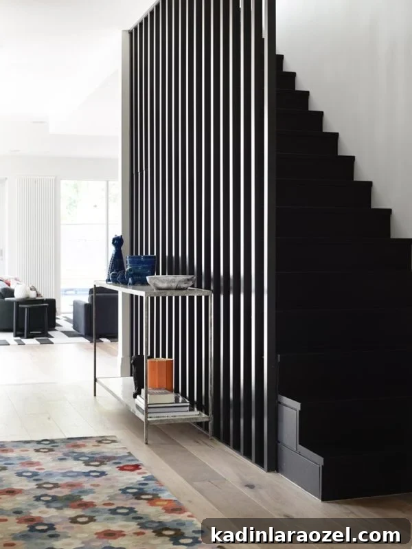 Modern Staircase Design Trend: Should You Upgrade Your Steps? 4 A modern staircase feature via Mim Design
