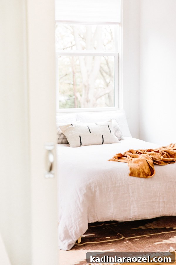 12 Guest Bedroom Updates in 12 Months + 5 Refresh Ideas 7 Peek into the minimal modern guest bedroom of Paper and Stitch founder, Brittni Mehlhoff. And get 5 tips for refreshing your guest bedroom before having guests. #guestroom #bedroom #organicmodern #minimalbedroom #bohobedroom #eclecticbedroom