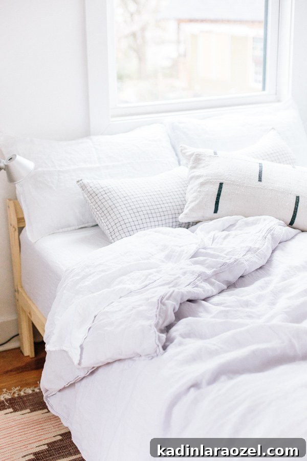 12 Guest Bedroom Updates in 12 Months + 5 Refresh Ideas 9 Peek into the minimal modern guest bedroom of Paper and Stitch founder, Brittni Mehlhoff. And get 5 tips for refreshing your guest bedroom before having guests. #guestroom #bedroom #organicmodern #minimalbedroom #bohobedroom #eclecticbedroom
