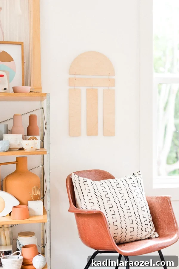 Geometric wall art hanging in a craft room