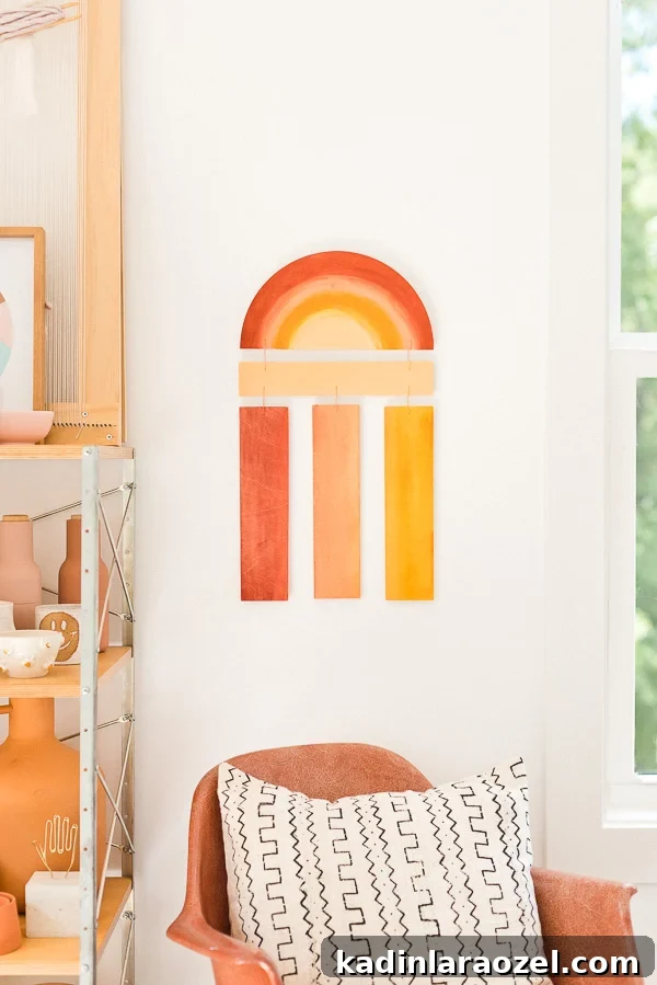 Rainbow wall art made of wood, in earthy neutral colors