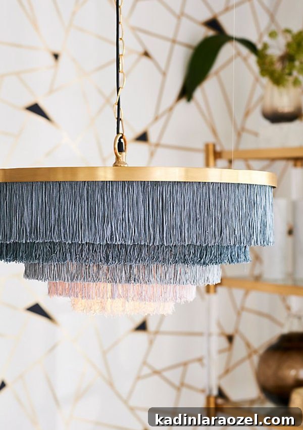 Fringe chandelier in ombre colors from grey to white