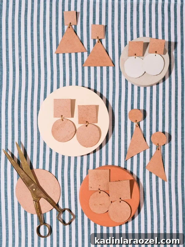 How to Make Bold Leather Statement Earrings: A Step-by-Step Guide 4 Leather statement earrings in various geometric shapes on striped linen