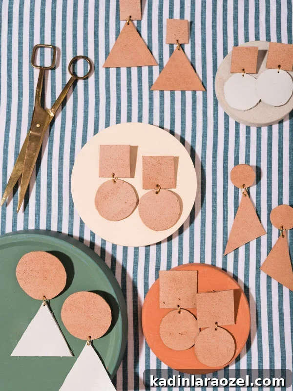 How to Make Bold Leather Statement Earrings: A Step-by-Step Guide 6 Geometric earrings made of leather, with scissors and striped linen