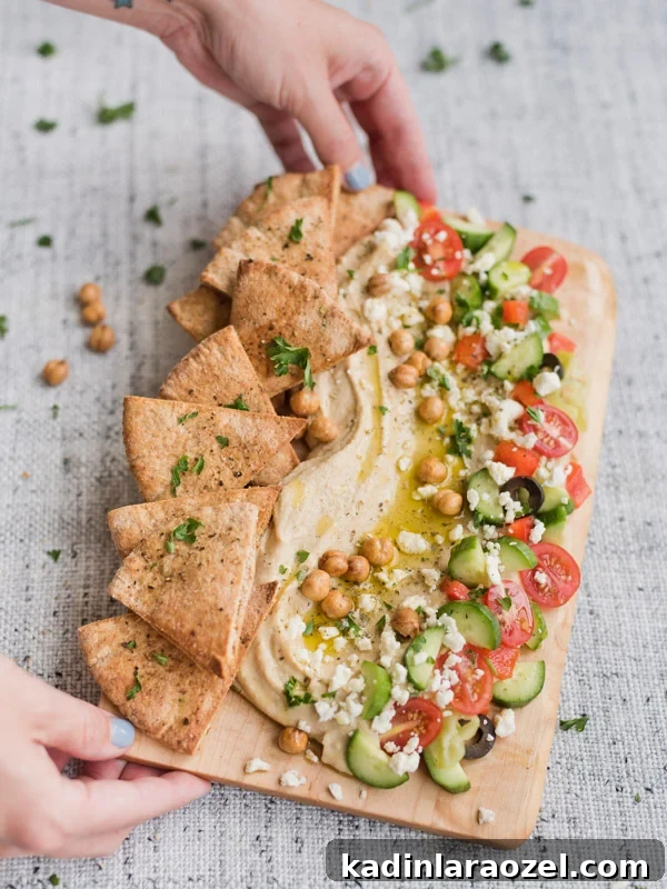 A greek hummus board idea that is as pretty as it is delicious! 