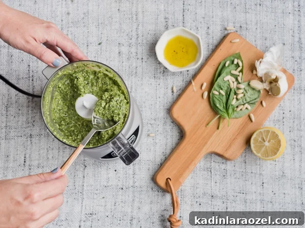 Making an easy pesto for a simple summer salad.