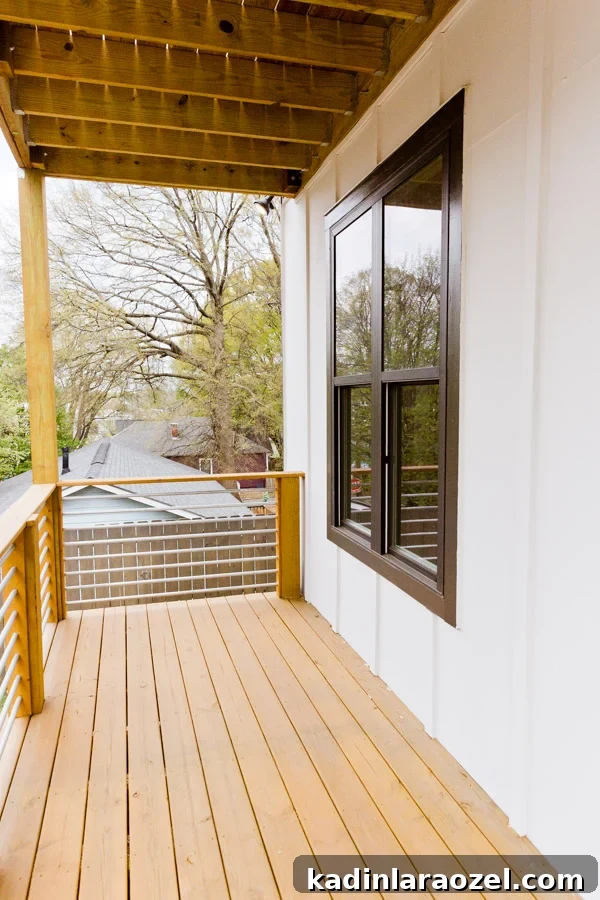 Front porch before. Click through for the full reveal of a small outdoor space that went from completely bare to cozy and comfortable with just a few items. #frontporchreveal #outdoorreveal #outdoormakeover #frontporchmakeover #beforeafterhome #porchmakeover