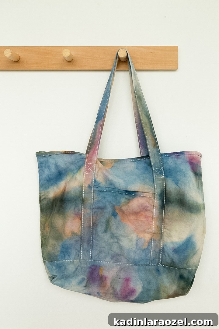 ice dyed tote bag hanging from wood hook