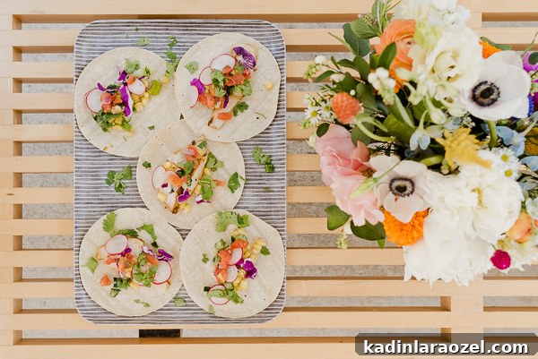 Fresh tacos and florals! Click through for entertaining tips from Brittni Mehlhoff of Paper and Stitch. #summerentertaining #entertainingideas #entertainingtips #dinnerparty #outdoorentertaining