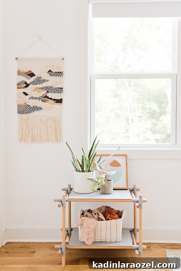 12 Rooms in 12 Months: Hayes’ Nursery Reveal 13 An organic modern nursery makeover. Click through for the full reveal (with before and after photos). #nursery #organicmodern #interiorhomedecor #roommakeover #babyroom