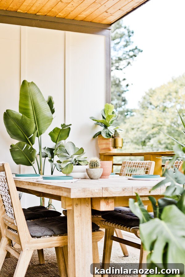 12 Back Porch Makeovers: Progress Over 12 Months 3 A small(ish) back porch gets a makeover, from completely empty to comfortable and stylish - Paper and Stitch. #porchmakeover #outdoorinspiration #modernoutdoorliving #organicmodernliving #outdoormakeover #outdoorentertaining