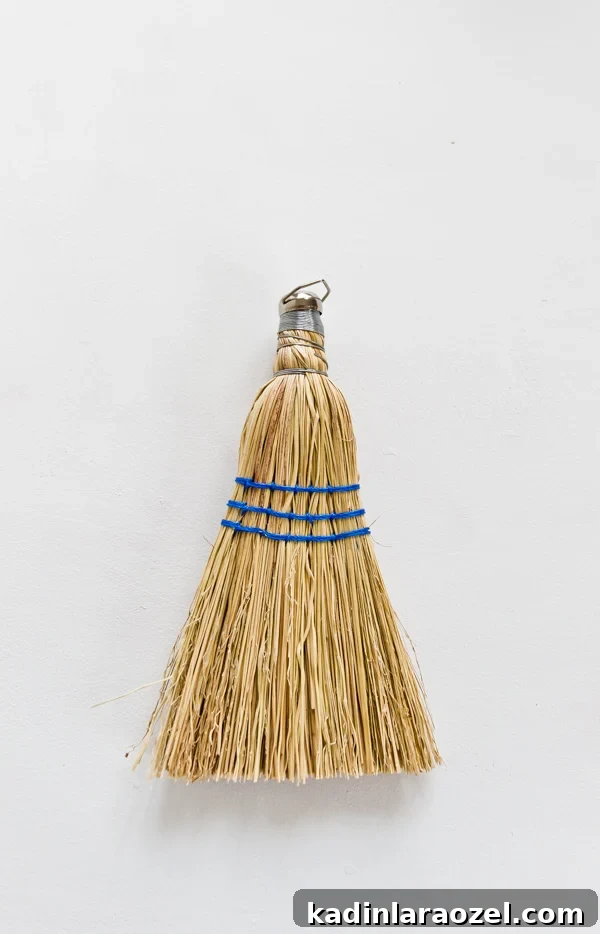 Small handheld broom before being dyed a color