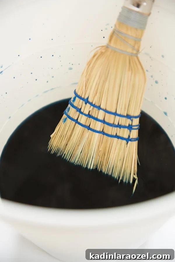Dyeing a broom to make it more colorful