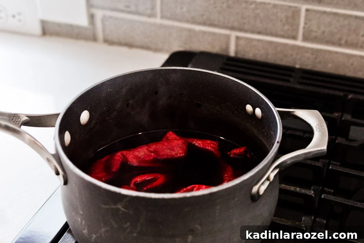 Natural Fabric Dyeing: How to Dye Clothes with Plant-Based Colors 5 Dyeing baby clothing on the stove in a large pot